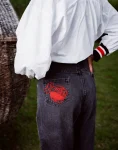 Faded-Black-Denim-With-Scarab-Beetles.webp