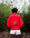 Red-Denim-Jacket-With-Beaded-Scarab-Beetle.webp